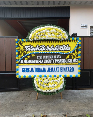 Papan Bunga Duka di Pontap